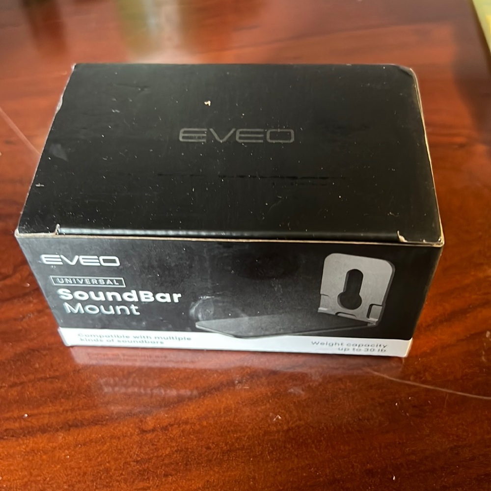 EVEO sound bar mount , with Velcro to help SB from moving. Up to 30 Lb’s